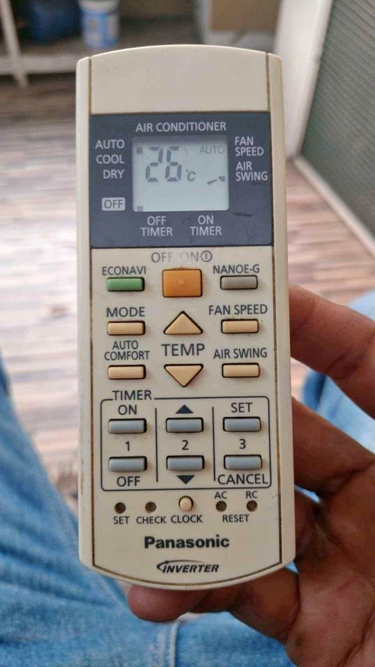 Panasonic remote control with cooling modes: Auto, Fan speed, Cool, and Eco mode.